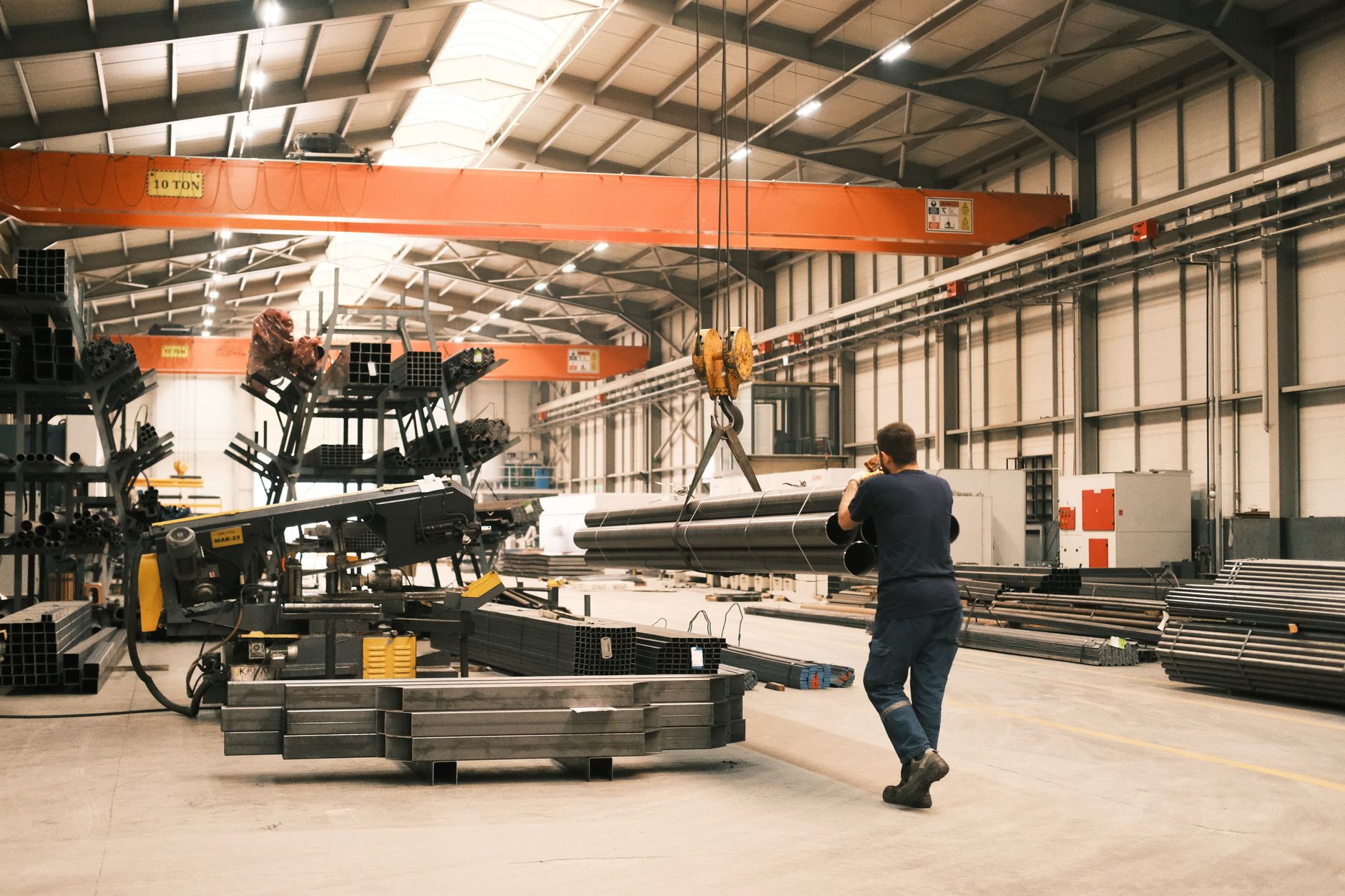 Interior of an industrial warehouse in Konya, Türkiye, showcasing heavy machinery and metalwork.